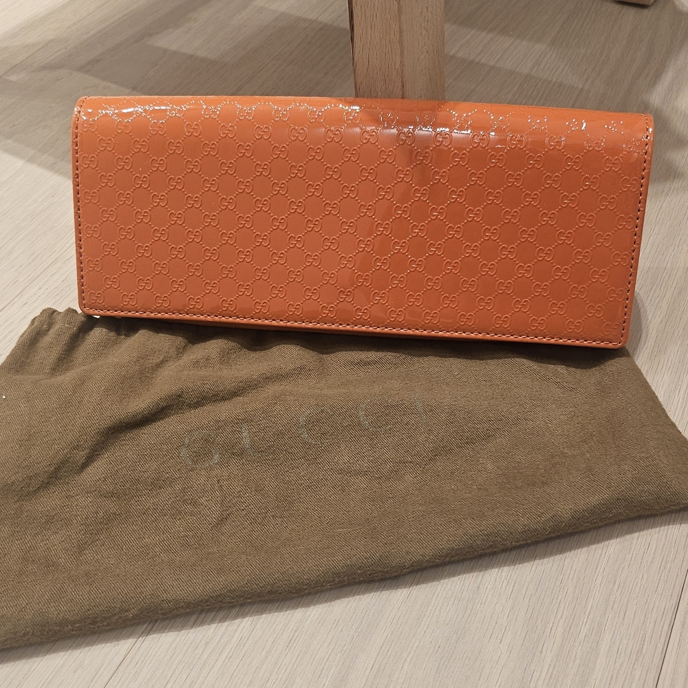 Gucci Glossy Orange Clutch